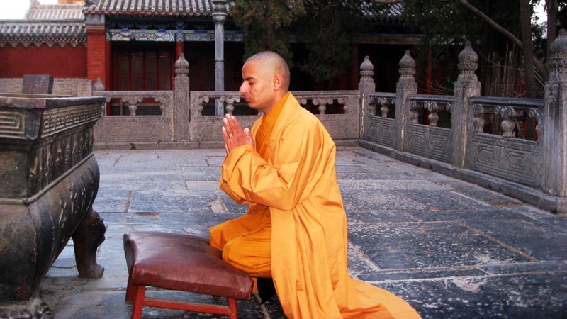 Gajanand Rajput praying at Shaolain Temple.